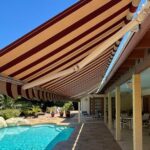 Motorized Retractable Awning Solutions: Revolutionizing Your Outdoor Space with Style and Ease
