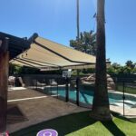 Motorized Retractable Awnings for Expanded Entertainment Space Pool