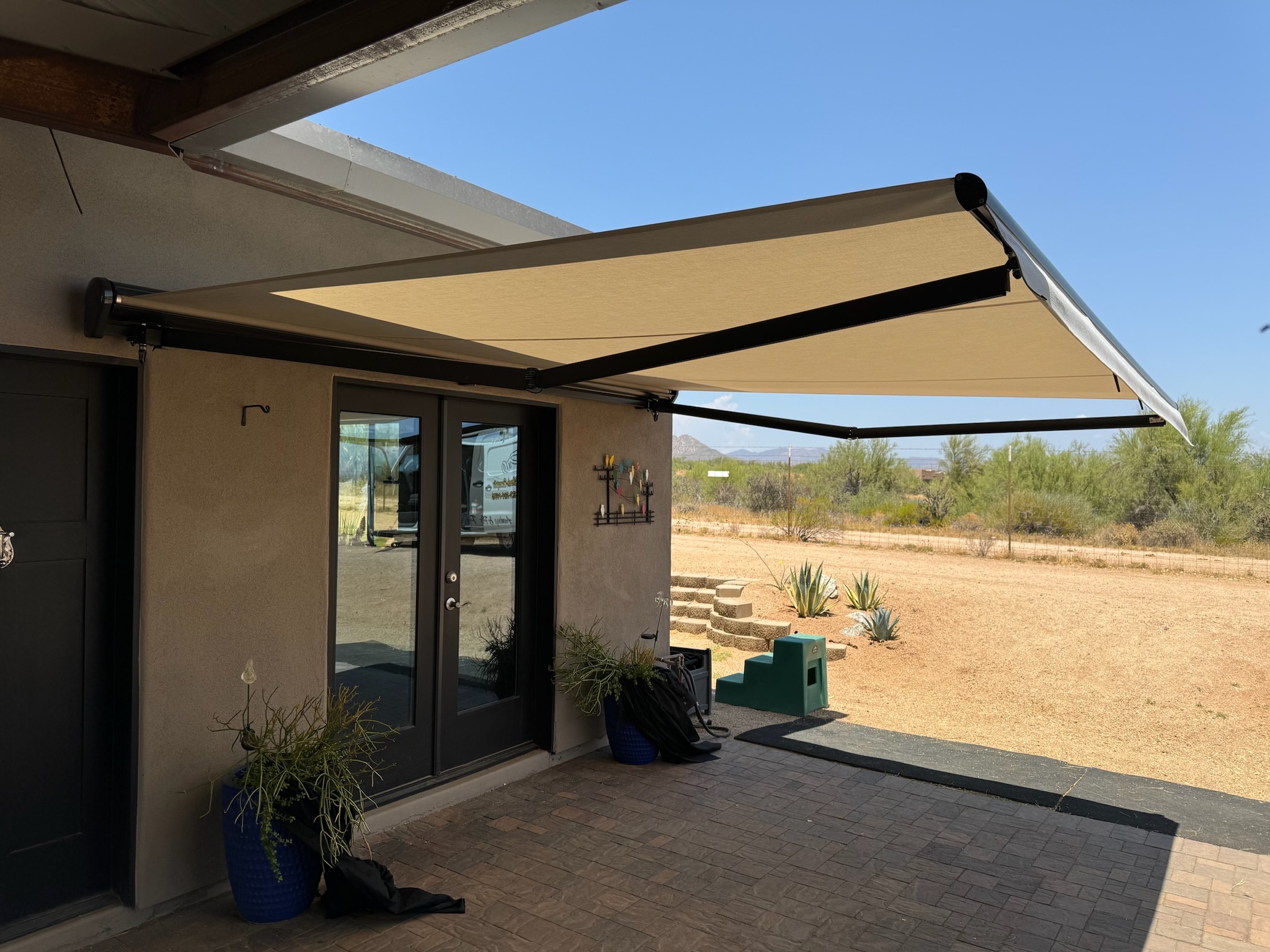 House Exterior Renovation Before and After: Retractable Awnings