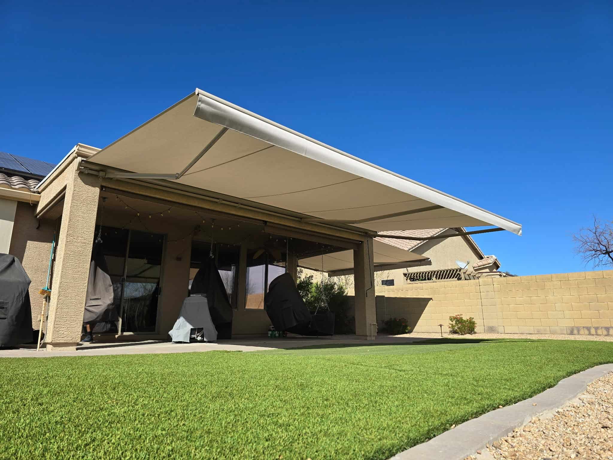 Retractable Awning over a Patio of a West Facing Home in Arizona