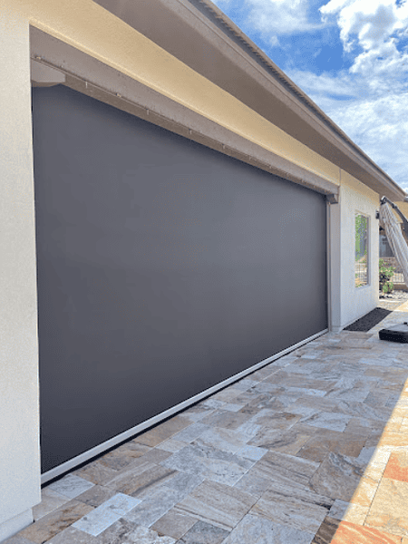 High-quality dark gray garage sunshade screen for sun protection and privacy.