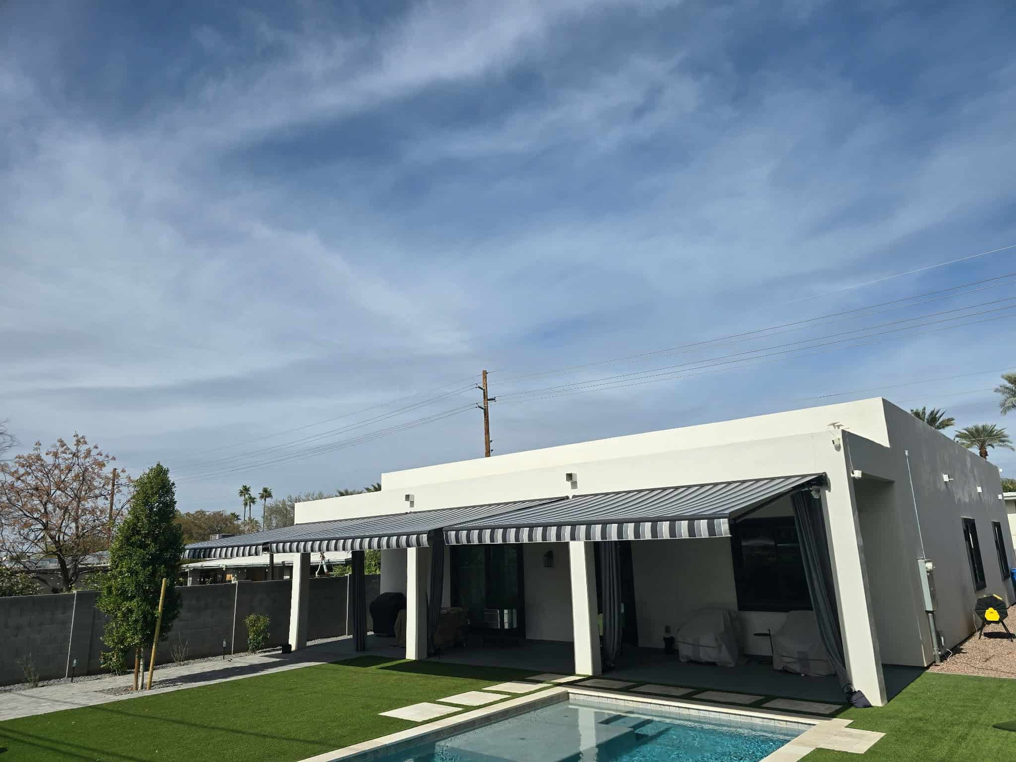 Retractable Awnings Over Patio and Pool Area