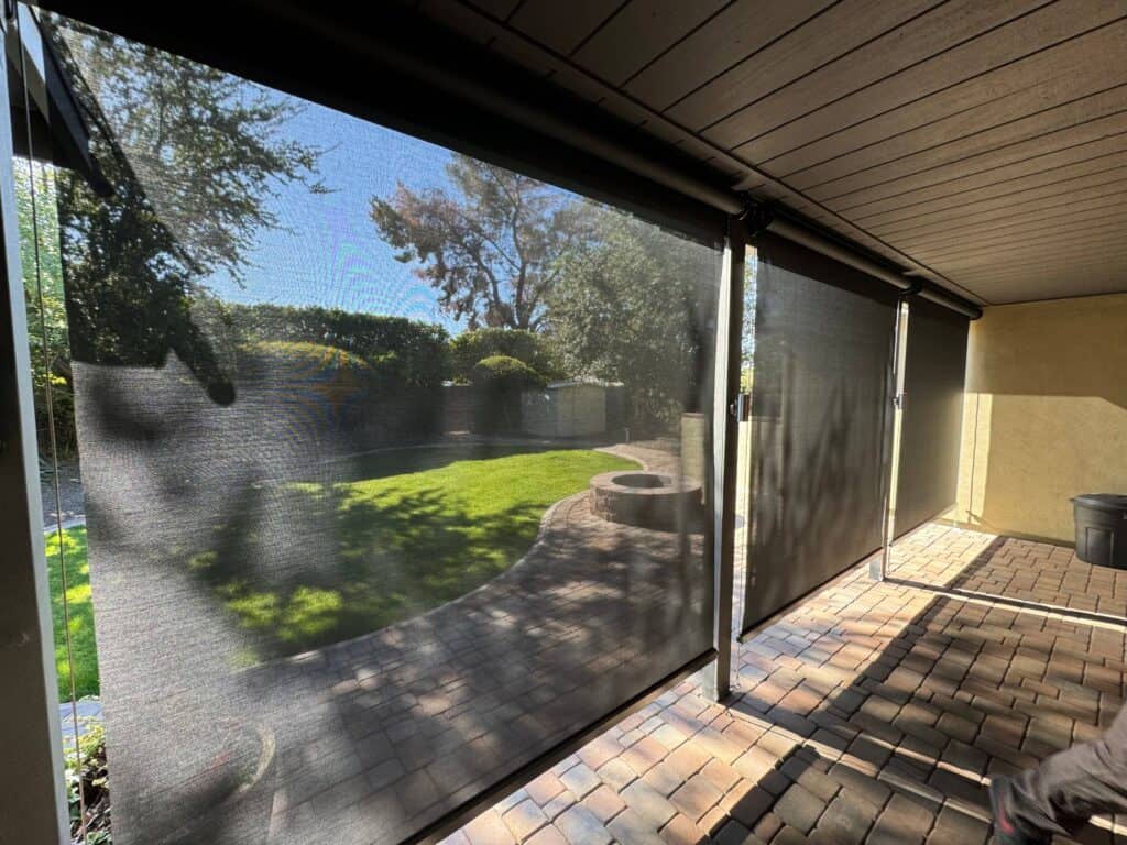 Solar Powered Patio Shades Installed on Covered Outdoor Area