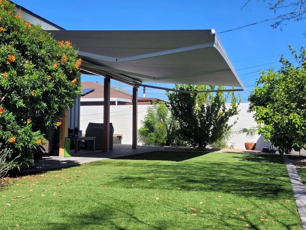 Retractable Awning Shading Backyard Lawn