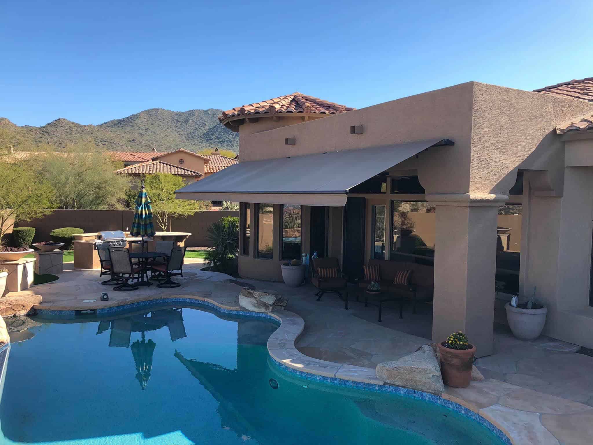 poolside-retractable remote motorized awnings-cave creek arizona installation az