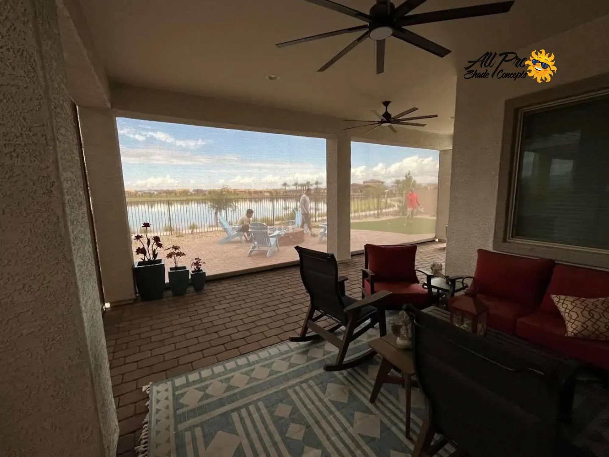 Covered Patio With Privacy Screens and a Lakeside View