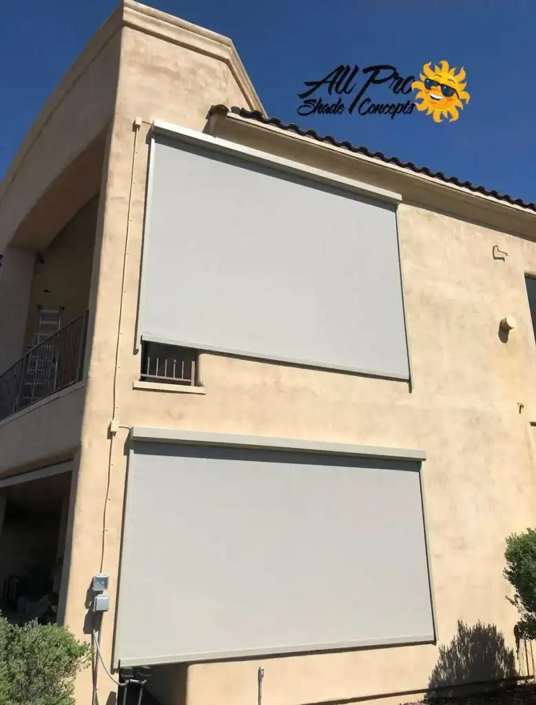 Large Exterior Roller Shades Installed on a Two-Story Home