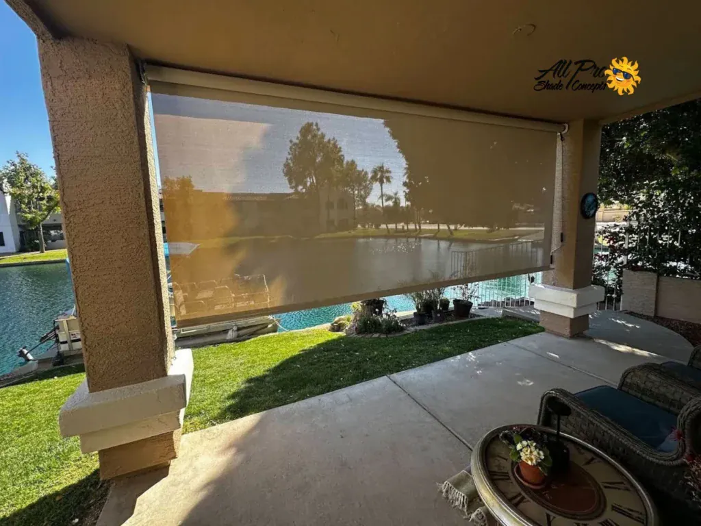 Partially Lowered Patio Privacy Shades Overlooking a Lake