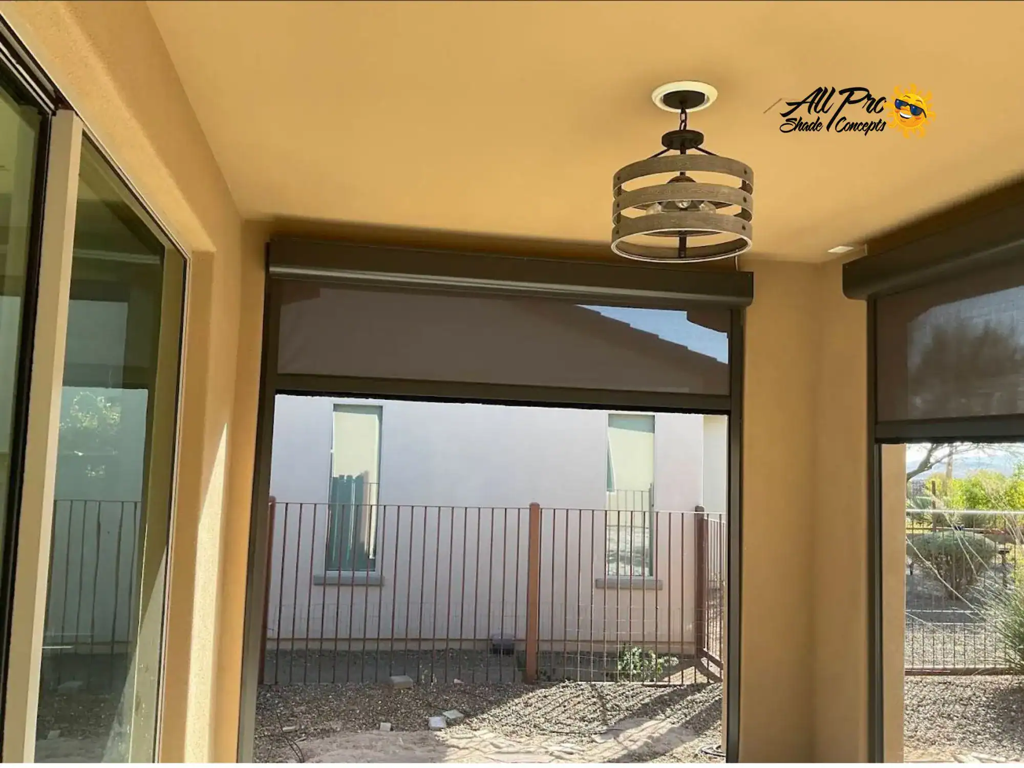Partially Lowered Patio Privacy Shades Facing a Nearby Home