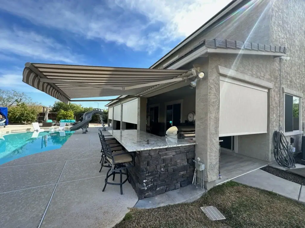 Retractable Awning and Exterior Shade over Outdoor Bar